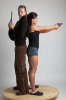 2021 01 OXANA AND XENIA STANDING POSE WITH GUNS 4 (6)